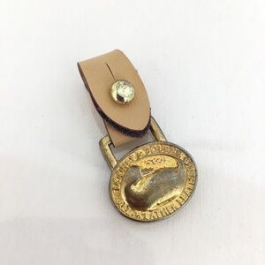 Vintage Dooney & Bourke Faux Leather Brass Duck Logo Hang Tag Charm Oval Tan